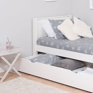 close-up-white-trundle-used-for-storage-or-sleeping