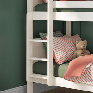 close-up-white-ladder-and-white-panelled-headboard