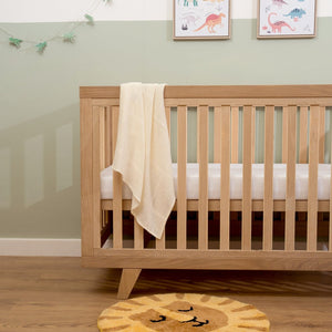 Blanket over Clair de Lune Oak Cot Bed